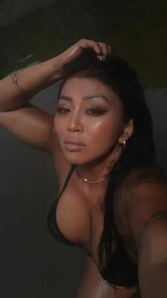 Black bikini Asian girl sunny afternoon...