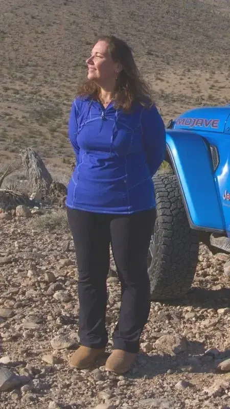 Blue Jeep, desert air, and the kind of smile that starts the trail.