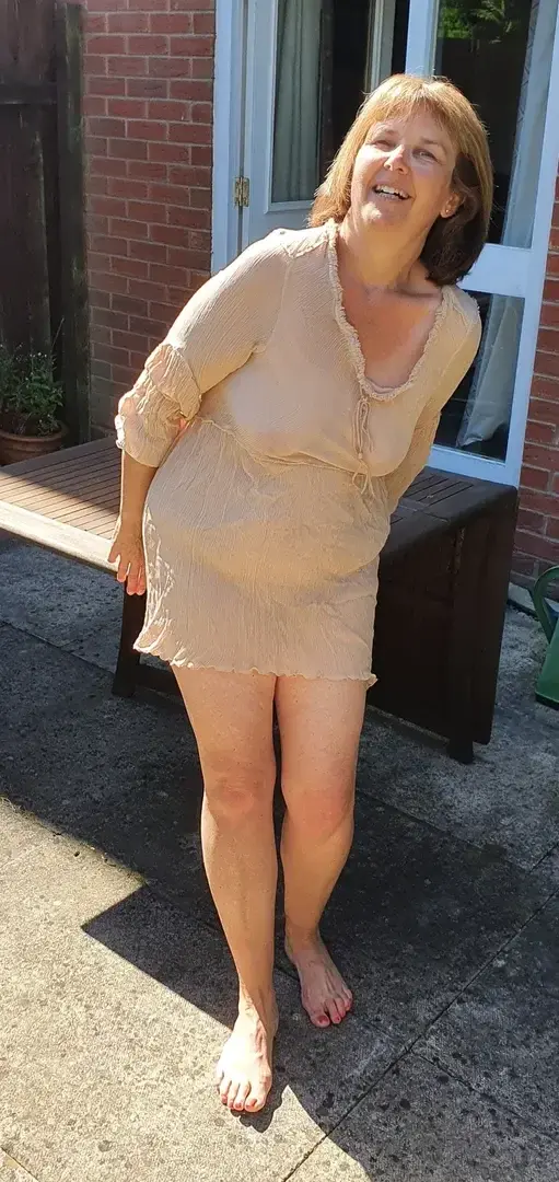 See through dress in garden